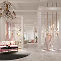 Elegant Bridal Shop Interior With Chandelier Pink Sofa Hanging Wedding Dresses And Columns