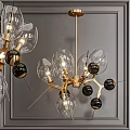 Modern Luxury Chandelier With Gold Frame Glass Shades And Black Spherical Decorations