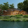 Traditional Wooden House with Porch Surrounded by Trees and Green Grass Near Calm Water