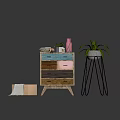 Wooden Dresser with Colorful Drawers Plant Stand Green Plant Vase Book and Wooden Box Towel