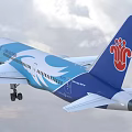 China Southern Airlines Passenger Aircraft With Blue White Livery And Patterns Flying In Clouds