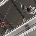 Modern Metallic Pendant Chandelier with Red Accents in Multi Level Shopping Mall Atrium