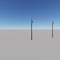 Row of Telephone Poles With Street Lamps Under Clear Blue Sky On Empty Ground