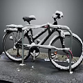 Snow Covered Bicycle Locked to Bike Rack on Snowy Ground