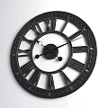 Black Wall Clock With Roman Numerals And Decorative Metal Frame Design