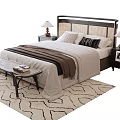 Double Bed With Bedside Tables Table Lamps Blanket Bench And Patterned Rug