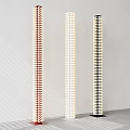 Three Modern Red White Black Floor Lamps With Slender Columnar Patterned Design Against Light Walls