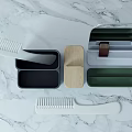 Functional Mirror With Storage Boxes And Combs On White Marble Countertop