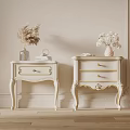 White Bedside Tables with Gold Accents and Flower Vases on Light Wall Wooden Floor