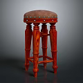 Classic Wooden Stool With Upholstered Seat Carved Legs And Decorative Rivet Details