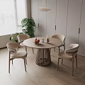 Round Wooden Dining Table with Four Light Beige Chairs Modern Interior Green Plant Window View