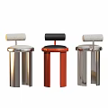 Three Modern Bar Stools With Metal Frames Red And Silver Colors Soft Padded Seats