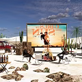 Desert Camping Site With Outdoor Movie Screen Cacti And Seating Area