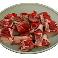 Fresh Raw Meat Chunks With Bone On White Plate And Green Herbs