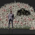 Elegant Floral Arch Installation for Gilded Night Event With Red White Flowers and Black Backdrop