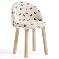Lovely Cream White Round Dining Table With Patterned Upholstered Chairs Set For Cozy Kids Room