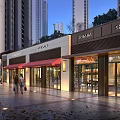 Modern Commercial Street With Luxury Brand Storefronts Pedestrians And High Rise Buildings