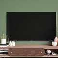 Modern Wooden TV Stand With TV Green Wall Plants Books And Decor