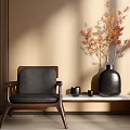 Modern Leisure Chair with Fabric and Wooden Accents Near Wall with Black Vase and Orange Flowers