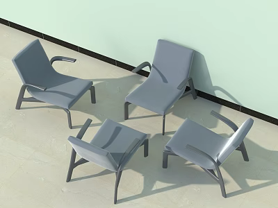 Four Gray Leisure Chairs Placed Against Light Green Wall On Light Colored Floor 3d model