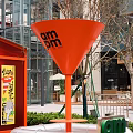 Vibrant Check in Photo Spot With Orange Funnel Metal Pipes And PM PM Green Logo