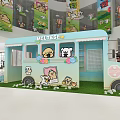Maltese Themed Bus Shaped Booth With Cartoon Dog Decorations And Grass In Mall