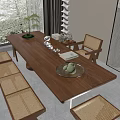 Wooden Tea Table and Chairs with Rattan Seats Tea Sets and Potted Plant in Natural Light