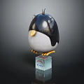 Modern Furniture Piece With Transparent Cube Base And Black White Penguin Decorative Ornament