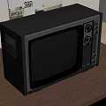 Vintage Black Television on Wooden Table with Classic Retro Design