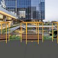 Modern Landscape Seats With Wooden Seats Yellow Metal Frames And Surrounding Greenery