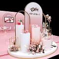 Dove Exhibition Display With Pink Background Floral Arch And Decor Items