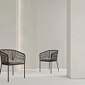 Modern Leisure Chairs With Woven Backrest And Dark Seat Cushion In Light Colored Space