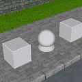 Roadside Facilities Square Stone Pillars And Round Ball With Carved Patterns On Paved Sidewalk