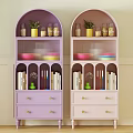 Purple and Pink Bookcases with Multiple Shelves Jars Plants Bowls Books and Gold Handle Drawers