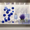 Window Display Decoration With Blue Spheres Lavender Plant Grid Basket And Clothes Hanger