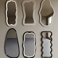 Various Shaped Decorative Mirrors With Curved Frames And Colored Borders On Wall