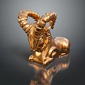 Golden Ram Sculpture With Spiral Horns In Reclining Pose On Dark Reflective Surface