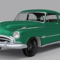 Green Classic Vintage Car Featuring Retro Body Design And Silver Trim