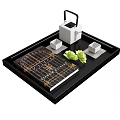 Elegant Tea Set with White Teapot Containers on Black Tray Gold Patterned Book Green Leaves