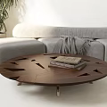 Modern Wooden Coffee Table With Geometric Interlocking Design Grey Sofa And Book On Top