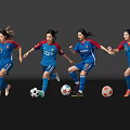Women in Blue Jerseys Playing Soccer with Multiple Colored Balls on Reflective Surface