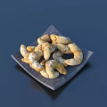 Freshly Baked Golden Croissants on Square Black Plate with Flaky Buttery Texture