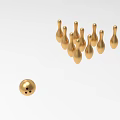 Golden Bowling Equipment Display Featuring A Shiny Ball And Upright Pins