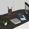 Essential Living Supplies On Modern Desktop With Pen Holder Books Tray Candles And Potted Plant