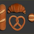 Golden Brown Assorted Baked Goods With Baguette Croissant Pretzel And Roll