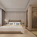 Modern Hotel Room Interior Featuring Large Bed White Bedspread Blue Pillows Open Glass Partition Bathroom