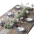 Elegant Tableware Set With Plates Wine Glasses And Decorative Greenery On Wooden Dining Table