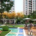 Modern Residential Landscape with High Rise Buildings Lush Trees Lawn and Leisure Seating Areas