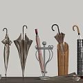 Various Umbrellas In Different Styles With Metal And Wooden Umbrella Stands