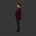 Stylish Woman in Maroon Top Black Pants Standing with Hands on Stomach Against Gray Background